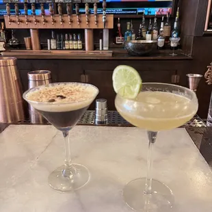 two cocktails on the bar