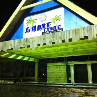 Outdoor bar by sand volleyball court