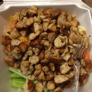 Grilled chicken salad. Comes w pickles, lettuce, cheese, onions, carrots, celery, and eggs. Was great!