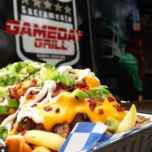 a tray of loaded fries