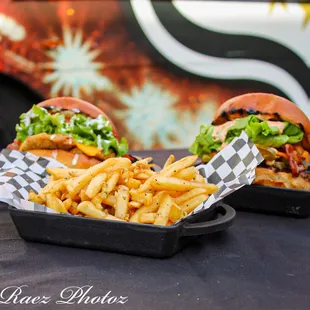 two burgers and french fries