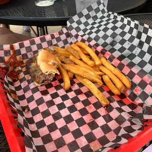 Halfback burger with fries, or what is left of it.