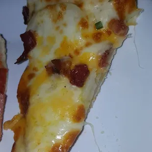 two slices of pizza on a plate