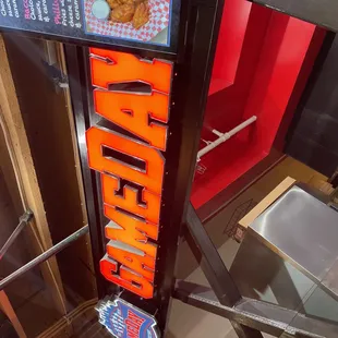 a neon sign for a restaurant