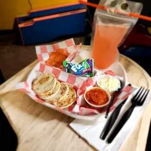 a tray of food and drink on a table