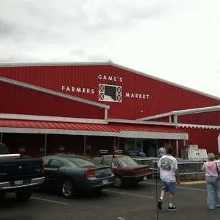 people walking in front of the store