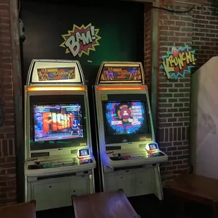 Two Marvel vs Capcom 2 cabinets