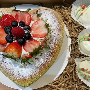 Matcha Japanese soufflé cheesecake with handmade white chocolate treats on the side