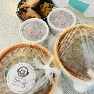 Two Gamjatang for to-go order. The gamjatang portion size was good! The side dishes was different from what is served in the store.