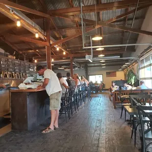 patrons at the bar