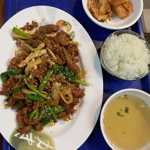 Spicy pork and calamari. The pork is absolutely delicious but the squid was a little tough. I&apos;d just get the spicy pork next time
