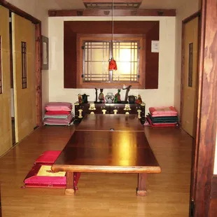 One of the 3 private Korean Rooms that open up into one big party room.