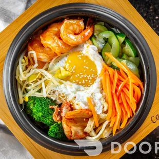 an overhead view of a bowl of food