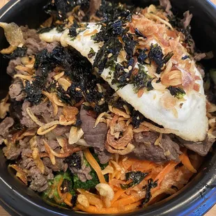 Hot Stone Bowl with purple rice, bulgogi, and all the mix ins!