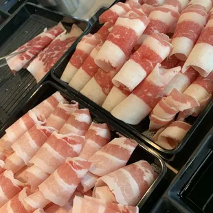 Think pork belly left, beef belly on right