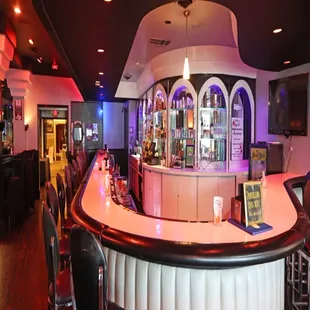 a bar with a curved counter