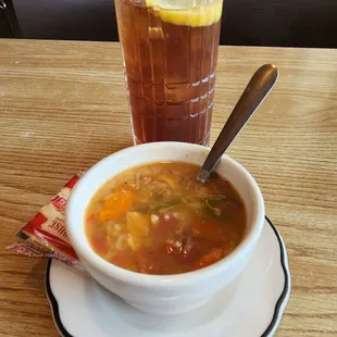 Cup of gumbo lacking Cajun spices and heat. It's good enough chicken rice soup I guess.