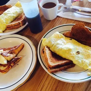 Veggie omelets with wheat toast and a side of french toast