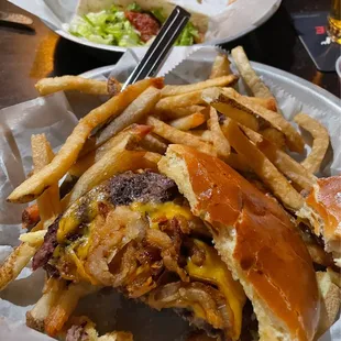 Western burger with steak taco in the background. Delicious!