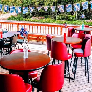 tables and chairs on a deck