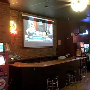 a large screen in a restaurant