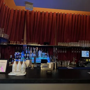 a bar with a lot of liquor