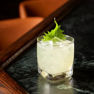 Okasan

-Mezcal
-Lime Juice
-Shiso
-Triple Syrup