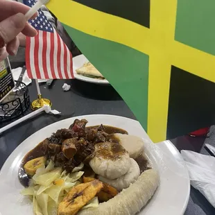 Oxtail, plantain, cabbage, ground provision