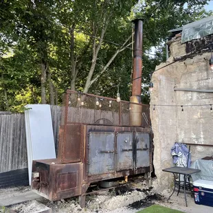 a rusted out building with a stove