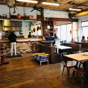 the kitchen and dining area of a restaurant