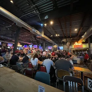 a large group of people sitting at tables