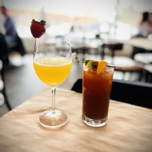 two cocktails on a table