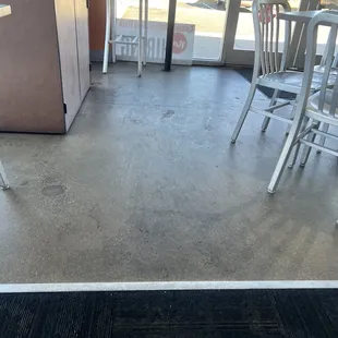 Floor hasn&apos;t been moped in a while.