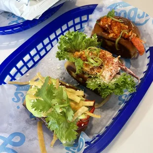 trio lobster mini rolls on a monday