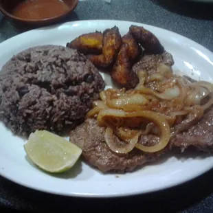 Cuban steak w/maduros. Great dish and better prices for great quality foods.