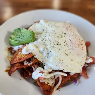 Chilaquiles! With perfect over easy eggs and fresh Pico de gallo.