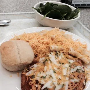 Chicken Parmesan, cheese rigatoni, baby spinach