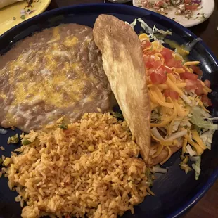 Chalupa with beans and rice. The shell doesn't hold together but the flavor is good.