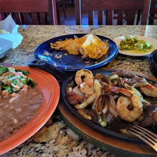 Fajita Trio for one but I made the mistake of ordering a nachos appetizer first!