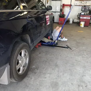 Me fixing car after shop ripped muffler off