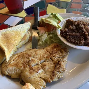 Chicken with side of beans.