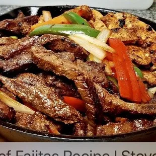 a skillet of beef and peppers