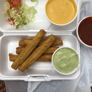 Chicken taquitos, queso, salsa &amp; chips
