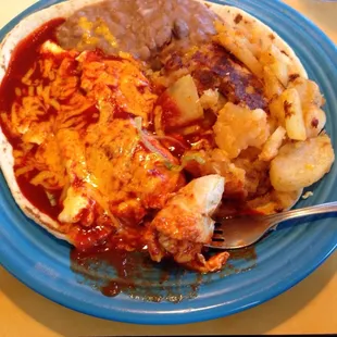 Huevos rancheros, red with scrambled eggs.