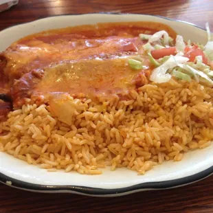 Relleno plate with red chili and rice.