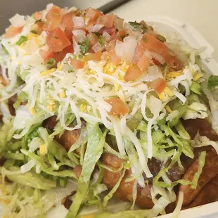 Chimichanga (deep fried burrito with toppings of choice)