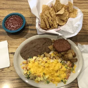 Chips and salsa, Huevos à la Mexicana with cheese and sausage