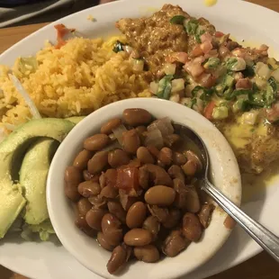 Chicken fried chicken with queso, pico, &amp; avocado. Best dish ever!!!