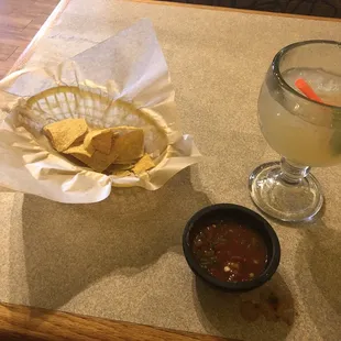 The chips and salsa are yummy this salsity has a good kick The Cadillac margarita was pricey but delicious!