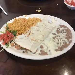 Beef Burrito with queso sauce